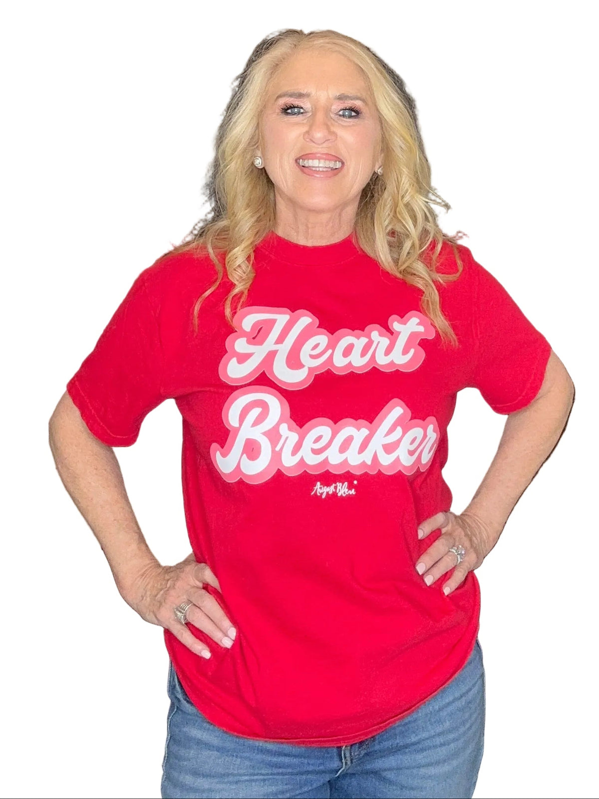 Person wearing a red 'Heart Breaker' shirt in a kitchen setting