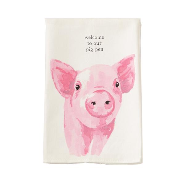 Tea towel with a pink pig illustration and text on a white background