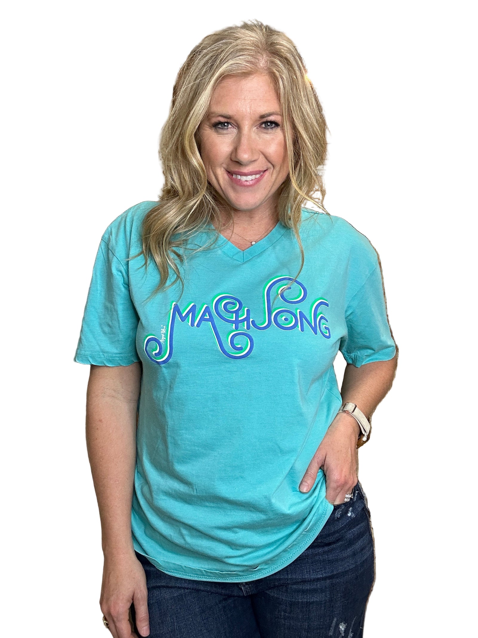 Person wearing a blue t-shirt with 'Make Love' text, standing in front of wooden cabinets.