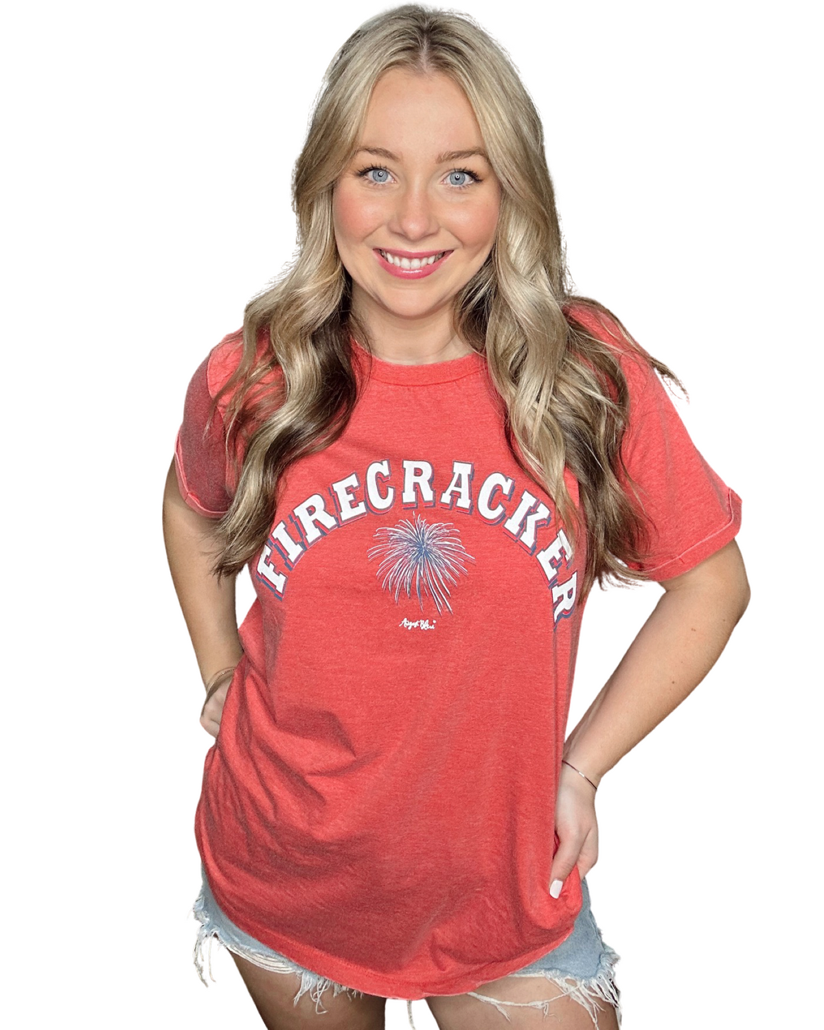 Firecracker written in white with a red white and blue firecracker burst art work on a red crew neck tee with small side slit 